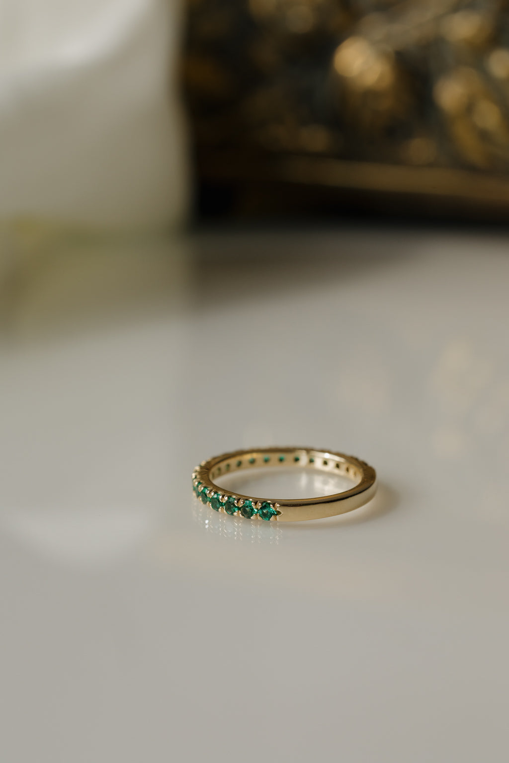 French Pave Band in Emerald