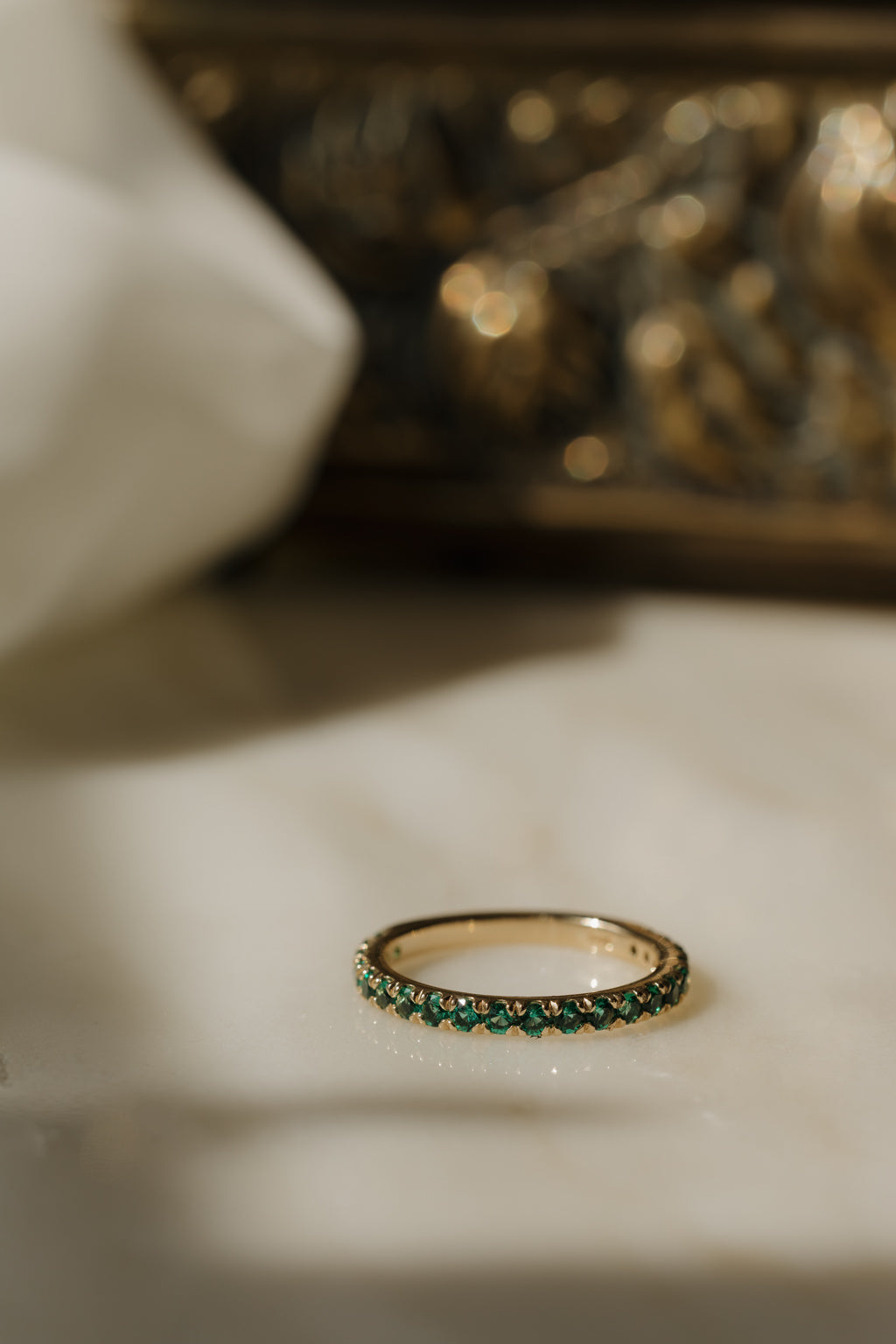 French Pave Band in Emerald
